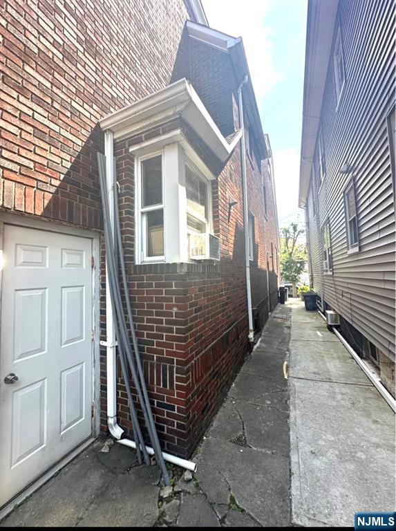 800 85th Street North Bergen, NJ 07047 - Photo 4 of 4 a view of a house with brick walls