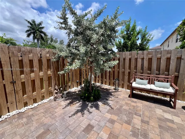 a view of entryway with stairs and wooden floor