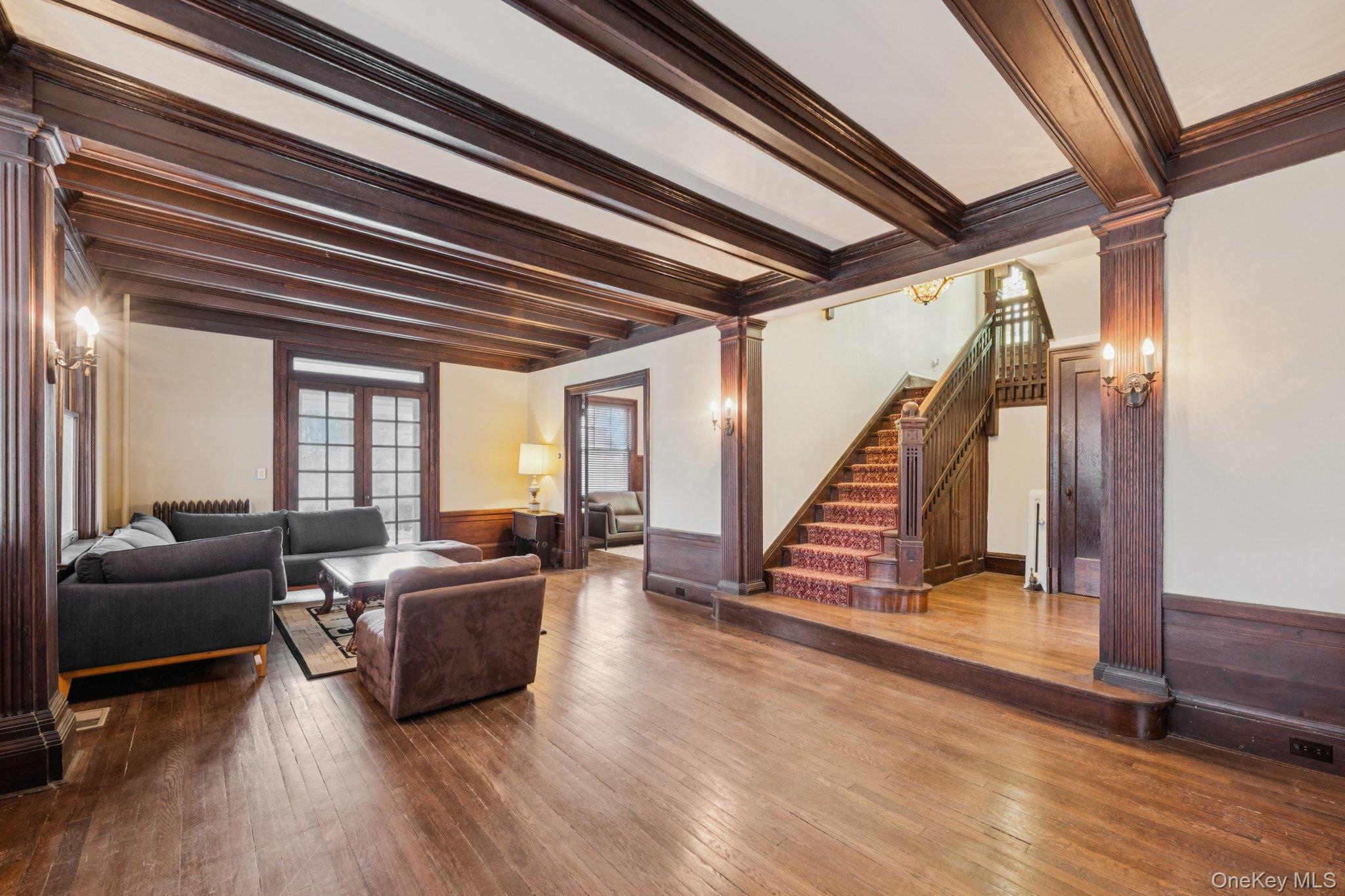 397 Split Rock Road Syosset, NY 11791 - Photo 9 of 29 a living room with furniture and wooden floor