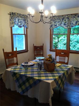 168 Warren Road Brimfield, MA 01010 - Photo 12 of 15 a table sitting next to a window