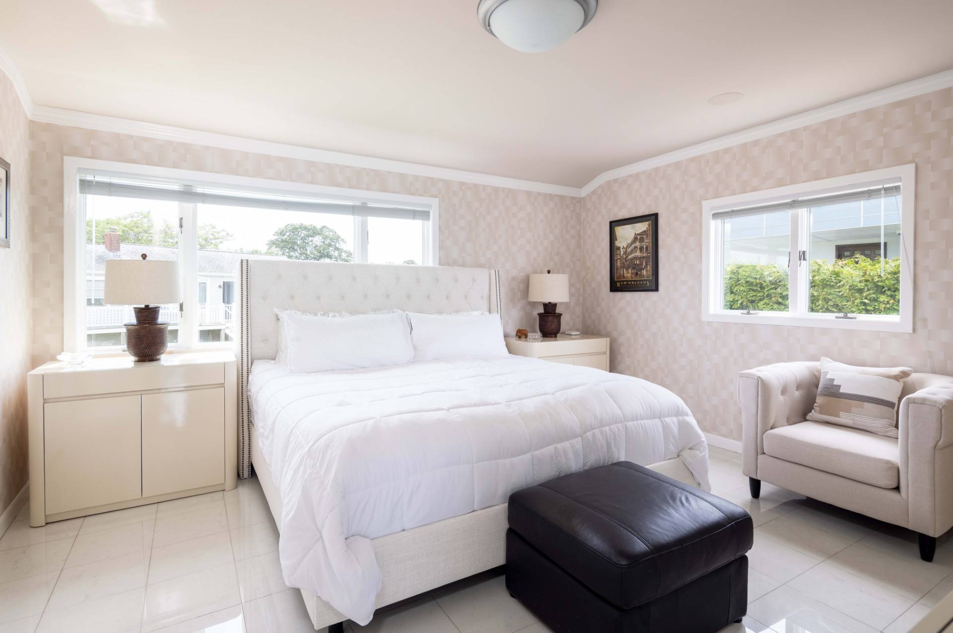 69 B Little Pine Lane East Quogue, NY 11942 - Photo 16 of 34 a bedroom with a bed and a couch