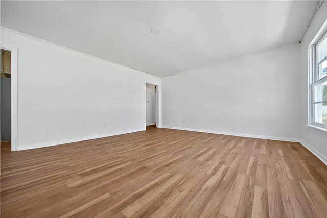 a view of an empty room and window