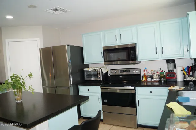 a living room with furniture and a couch