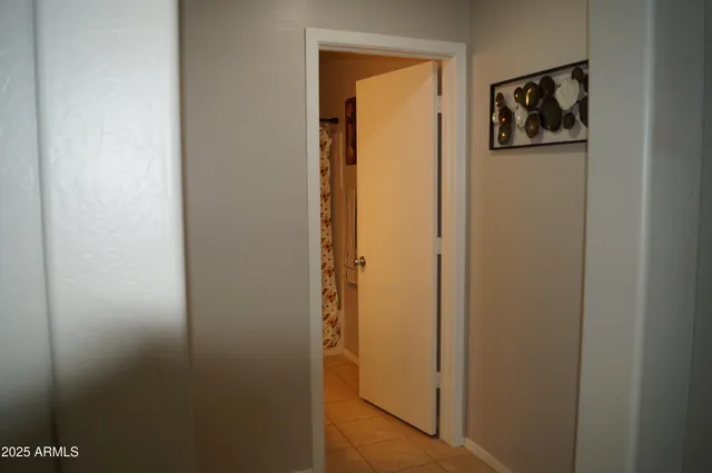 a view of a bedroom with a window