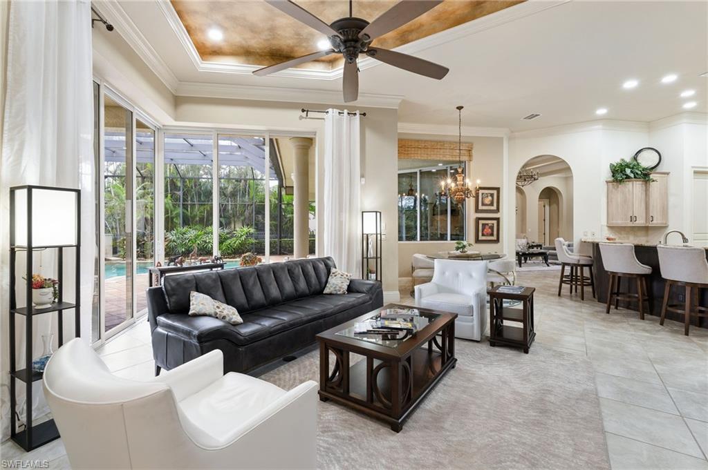 20421 Chapel Trace Estero, FL 33928 - Photo 13 of 50 a living room with furniture and a large window