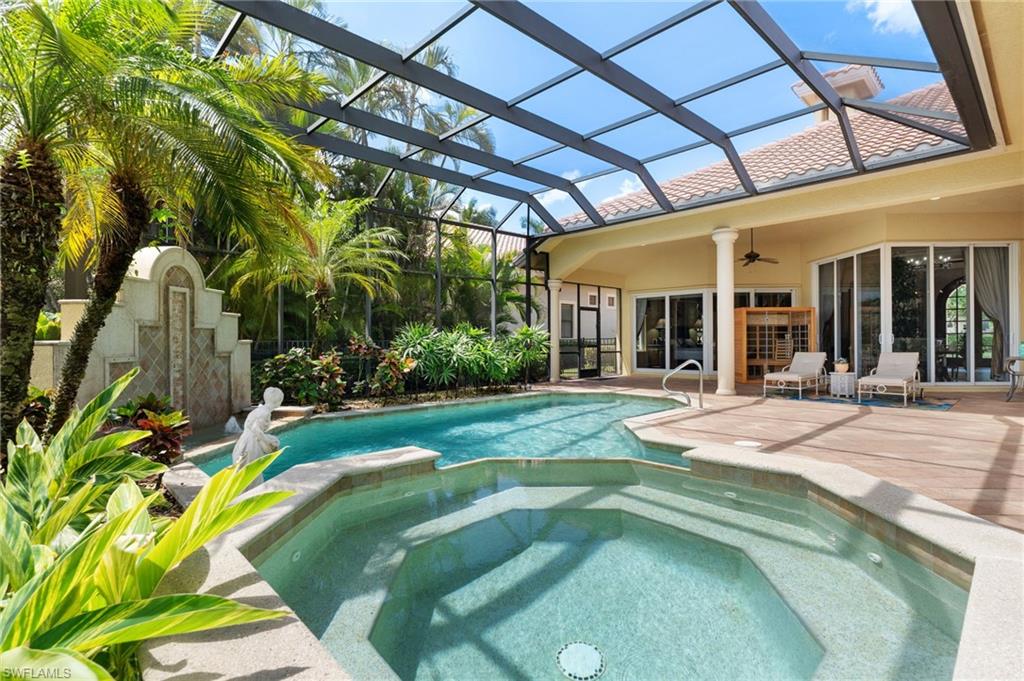 20421 Chapel Trace Estero, FL 33928 - Photo 18 of 50 a swimming pool with outdoor seating and yard