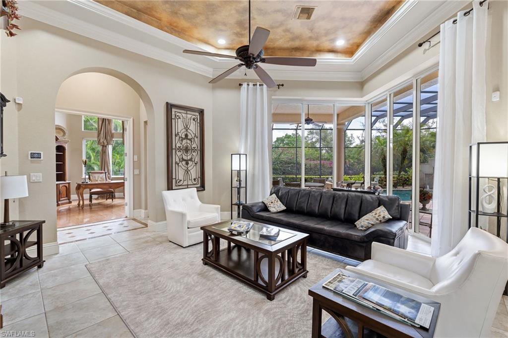 20421 Chapel Trace Estero, FL 33928 - Photo 8 of 50 a living room with furniture and a large window