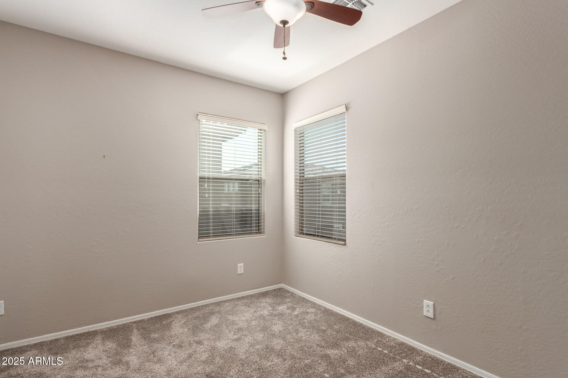 15820 North 74th Drive Peoria, AZ 85382 - Photo 20 of 33 a view of an empty room with a window