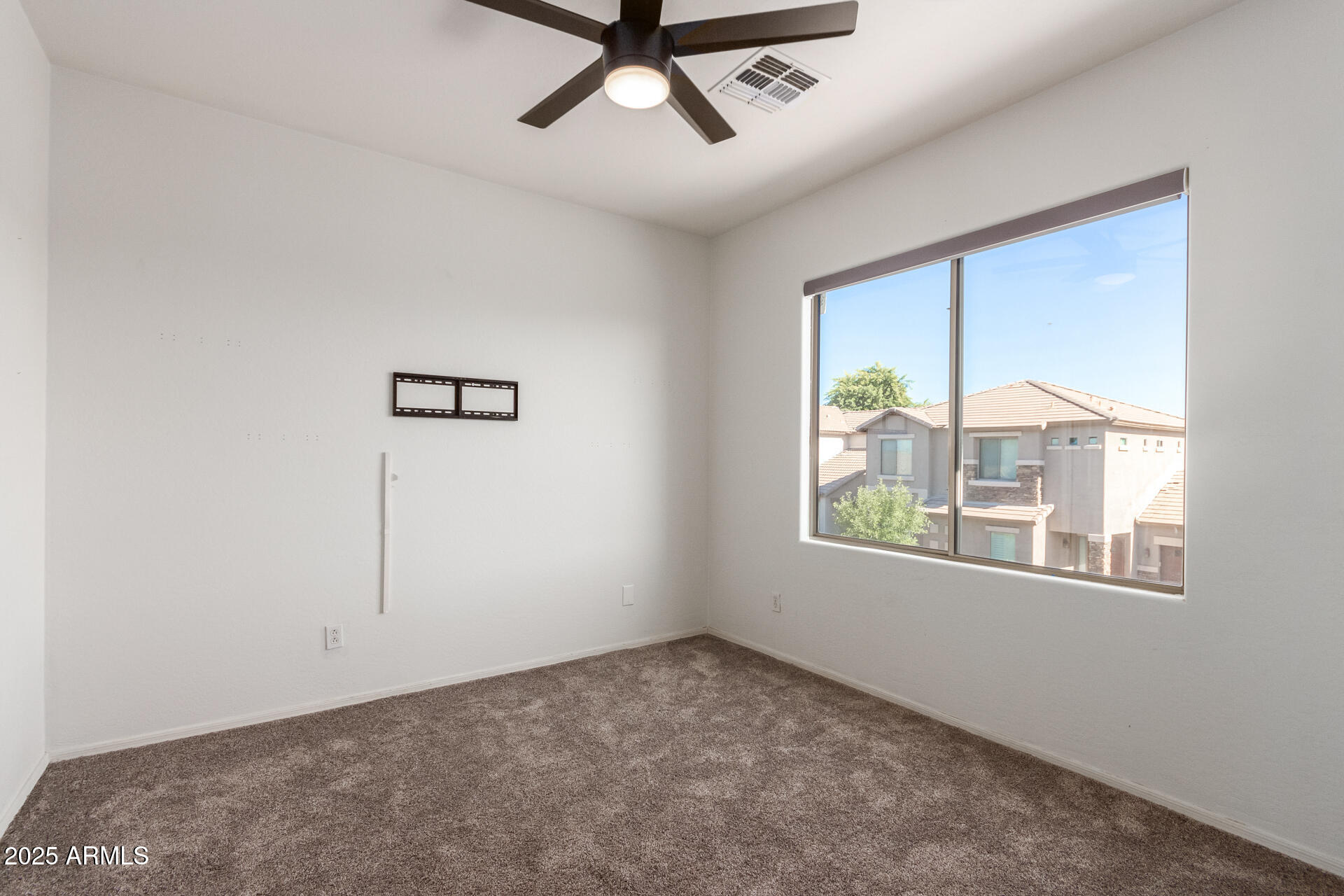 15820 North 74th Drive Peoria, AZ 85382 - Photo 25 of 33 an empty room with windows