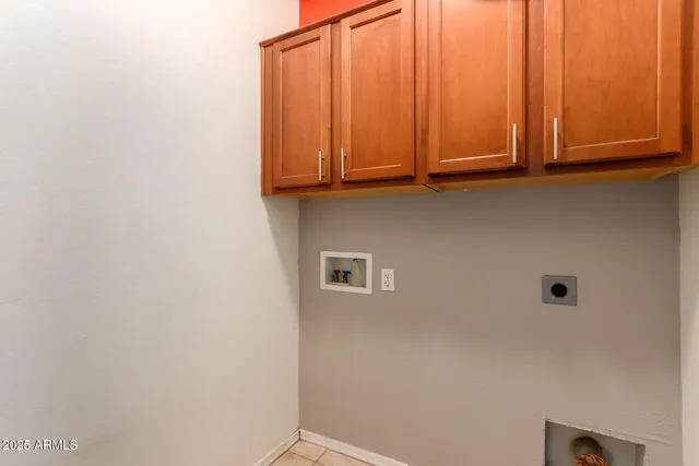 a view of cabinets and wooden floor