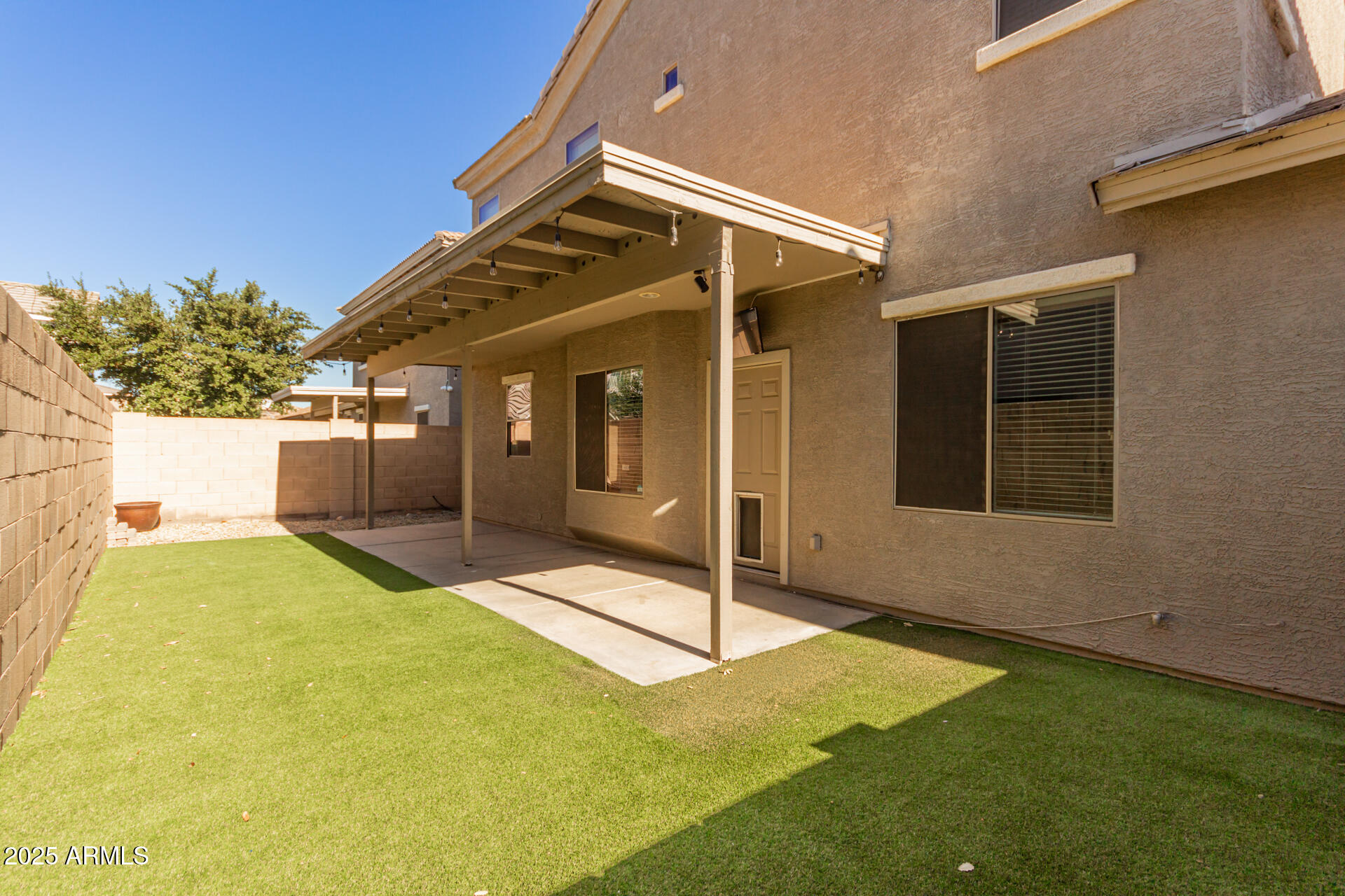 15820 North 74th Drive Peoria, AZ 85382 - Photo 32 of 33 a view of a house with patio