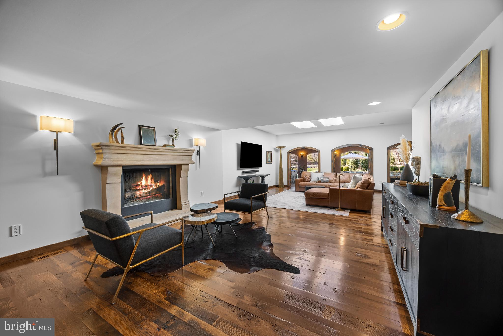 1344 Tydings Road Annapolis, MD 21409 - Photo 7 of 43 Sitting area with Fireplace; Living room beyond