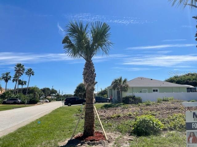 a view of a house with a garden