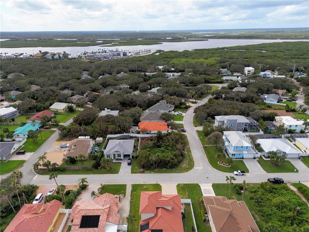 4734 Riverglen Boulevard Ponce Inlet, FL 32127 - Photo 12 of 24 an aerial view of residential houses with outdoor space