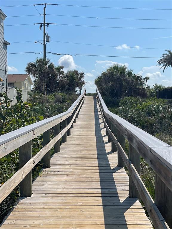 4734 Riverglen Boulevard Ponce Inlet, FL 32127 - Photo 18 of 24 a view of a balcony with an outdoor space