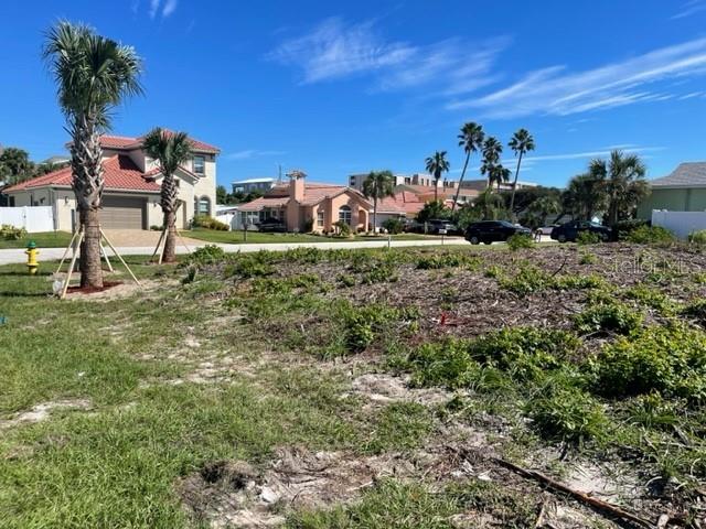 4734 Riverglen Boulevard Ponce Inlet, FL 32127 - Photo 2 of 24 a view of a house with a yard