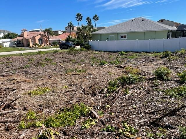 4734 Riverglen Boulevard Ponce Inlet, FL 32127 - Photo 8 of 24 a front view of a house with a yard
