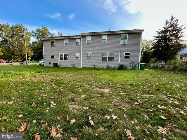 a view of a back yard of the house