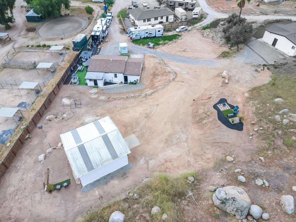 13510 Willow Road Lakeside, CA 92040 - Photo 26 of 35 You can see from this photo that there is a circular driveway going around the barn