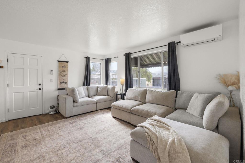 13510 Willow Road Lakeside, CA 92040 - Photo 7 of 35 Split Unit in Living Room - furniture and rugs convey