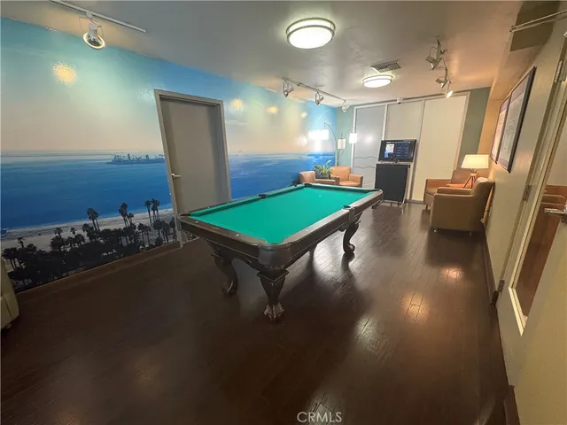 a room with lots of trees and plants