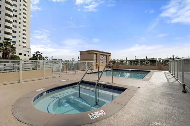 a view of a swimming pool with a terrace