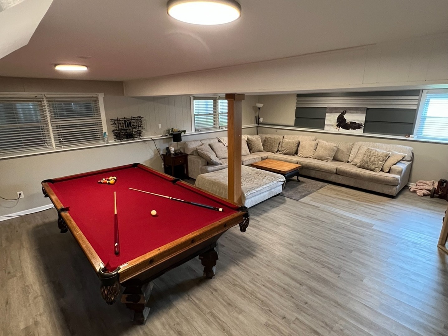 43W760 Rowe Road Elburn, IL 60119 - Photo 11 of 19 a room with furniture pool table wooden floor and windows