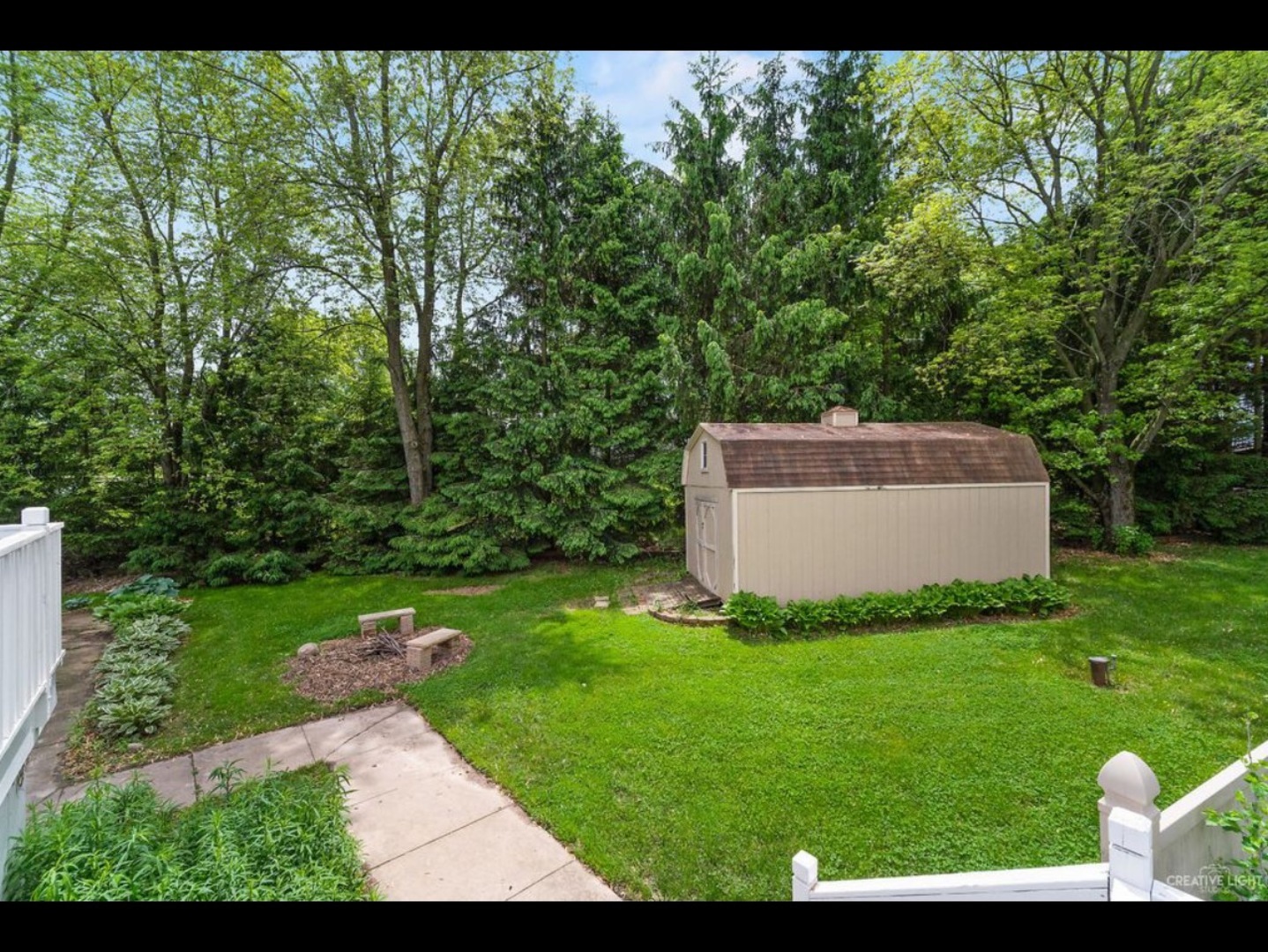 43W760 Rowe Road Elburn, IL 60119 - Photo 17 of 19 a view of a backyard with a garden
