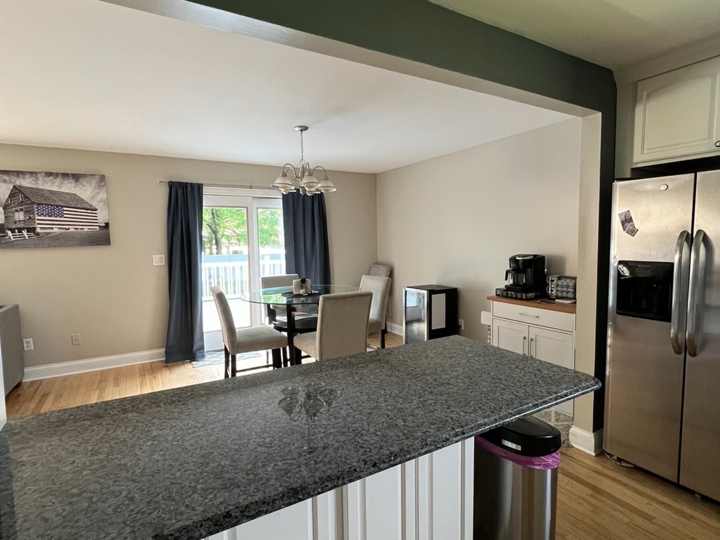 43W760 Rowe Road Elburn, IL 60119 - Photo 3 of 19 a living room with stainless steel appliances kitchen island granite countertop furniture and a kitchen view