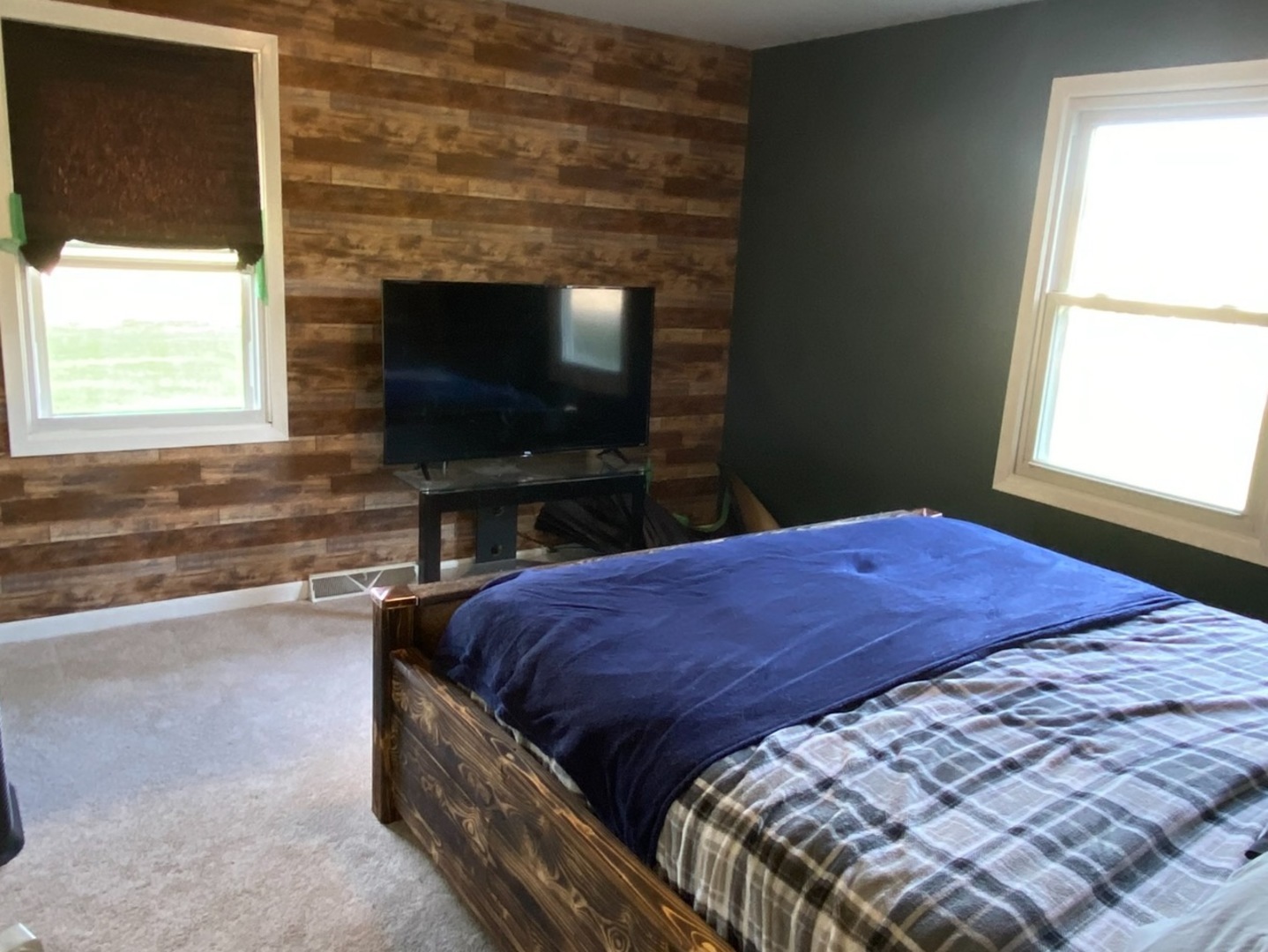 43W760 Rowe Road Elburn, IL 60119 - Photo 6 of 19 a bedroom with a bed and a flat screen tv