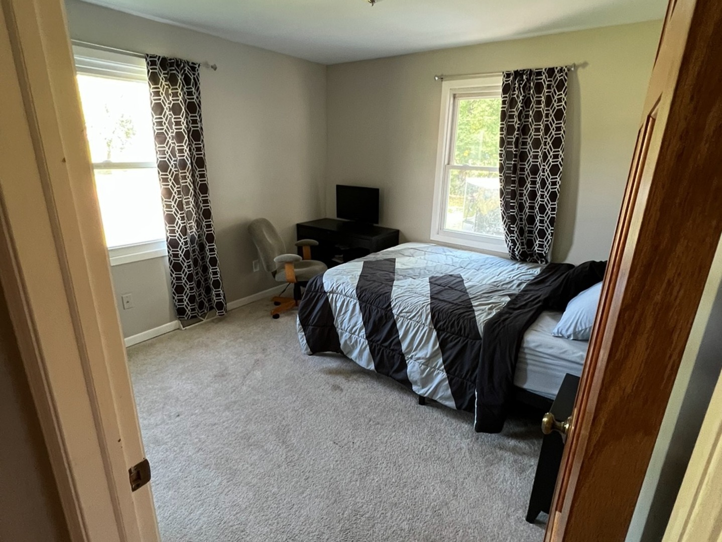 43W760 Rowe Road Elburn, IL 60119 - Photo 7 of 19 a bedroom with a bed and a window