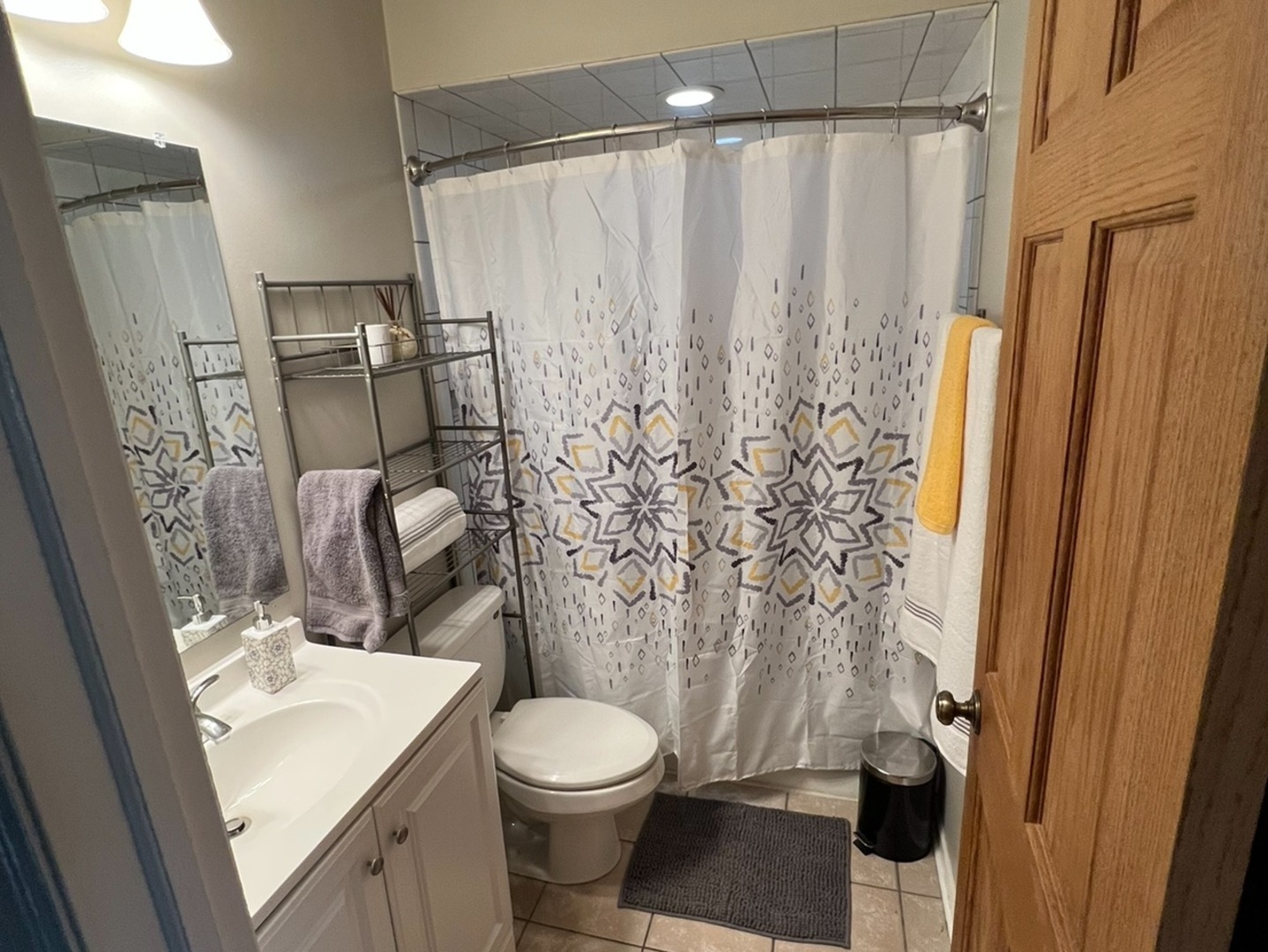 43W760 Rowe Road Elburn, IL 60119 - Photo 9 of 19 a bathroom with a sink toilet and shower