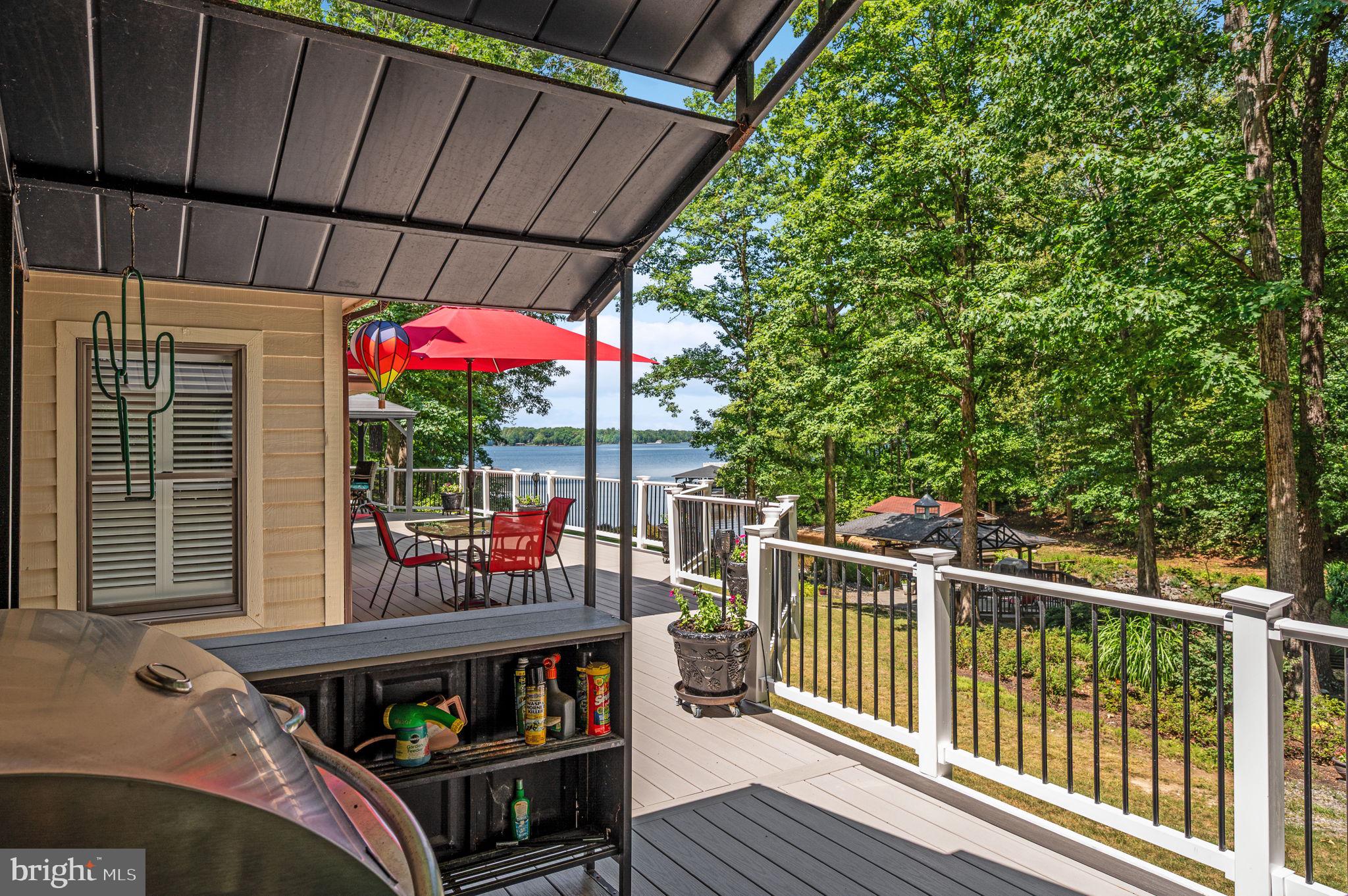 11105 Waddell Road Bumpass, VA 23024 - Photo 61 of 76 a view of roof deck with a patio