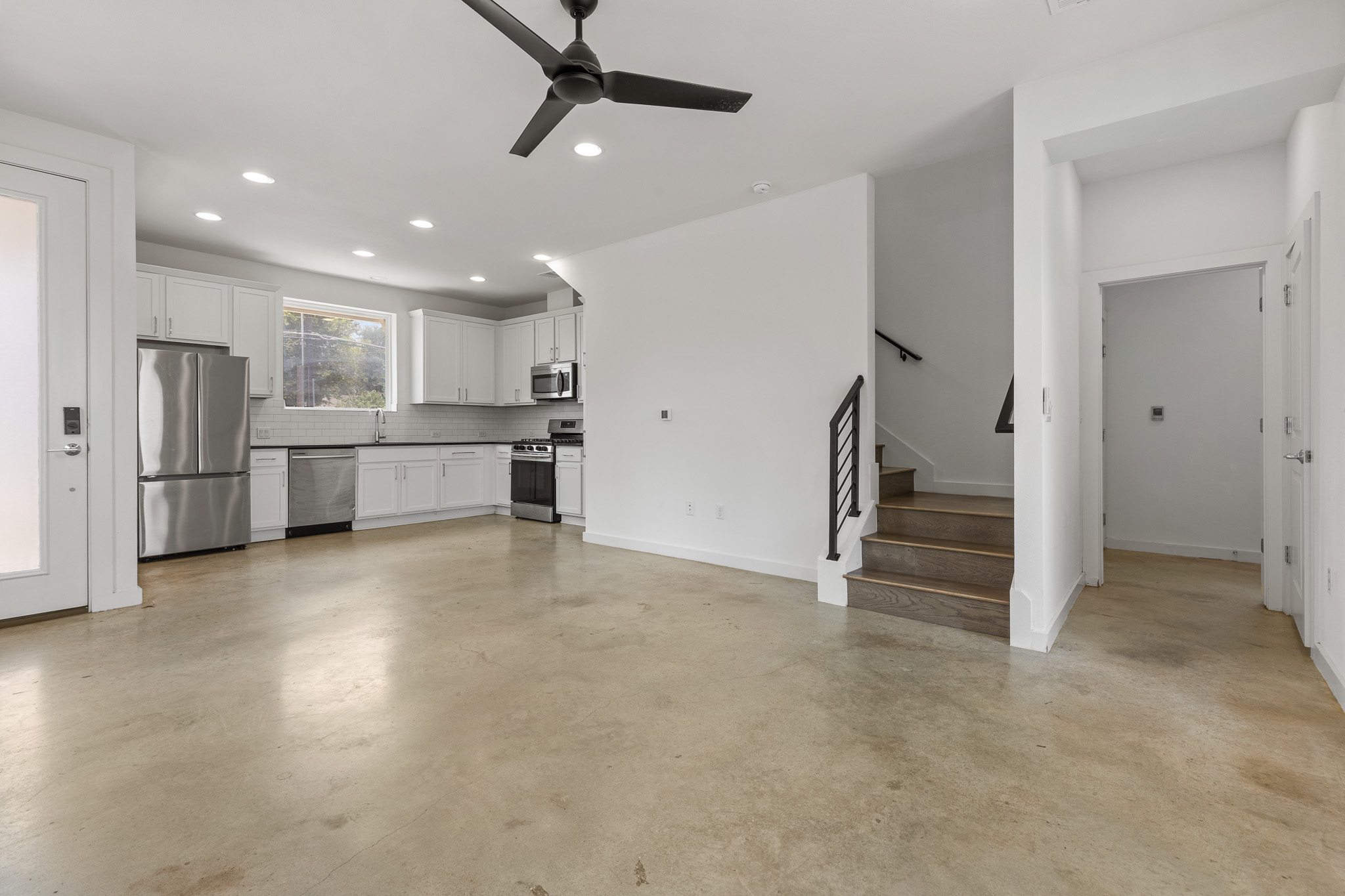 2604 Wheless Lane, Unit 1 Austin, TX 78723 - Photo 38 of 38 Open floor plan flows seamlessly from living space to kitchen—perfect for entertaining and everyday living.