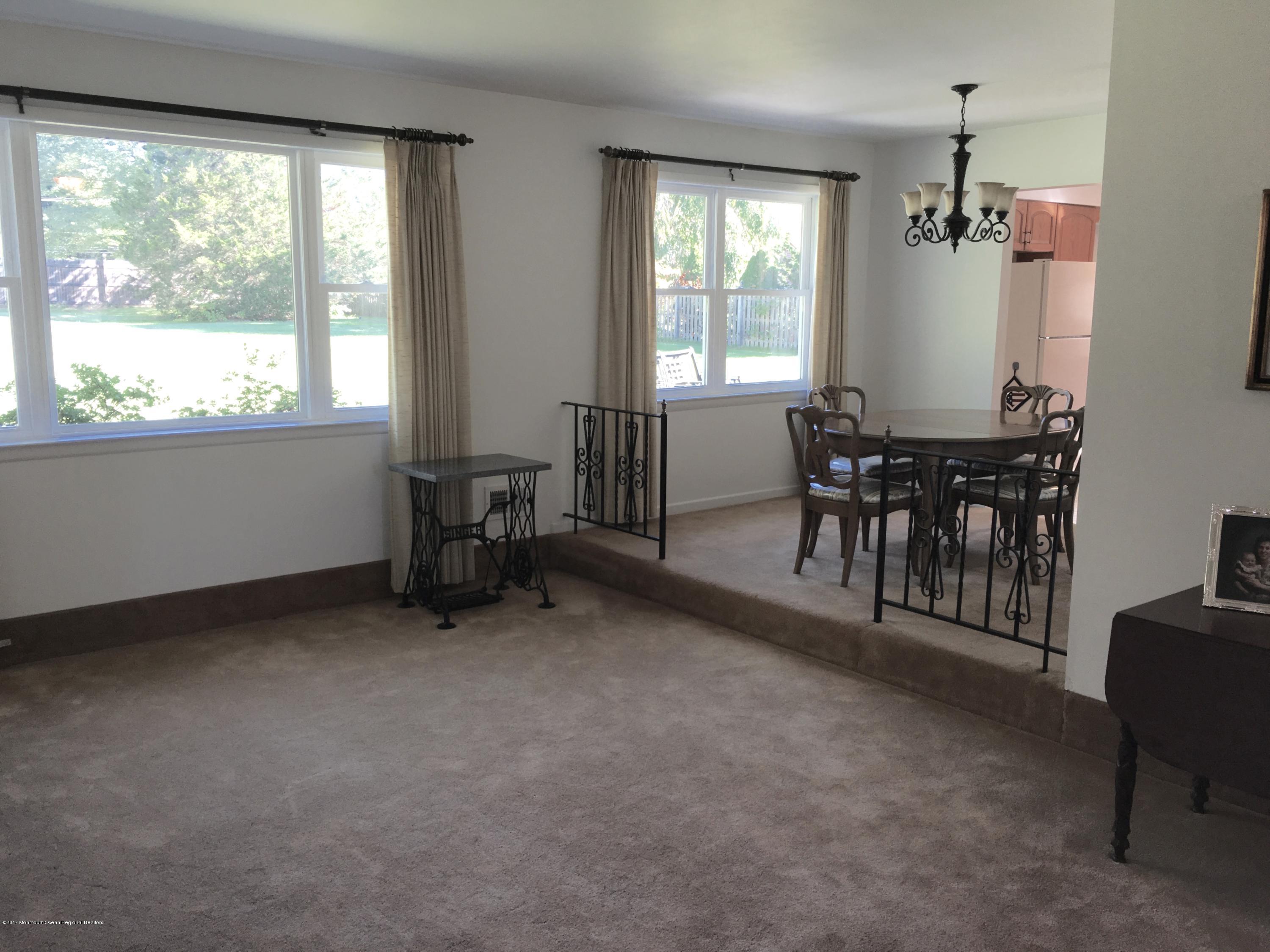 10 Fenimore Road Freehold, NJ 07728 - Photo 14 of 36 a view of a livingroom with furniture and window