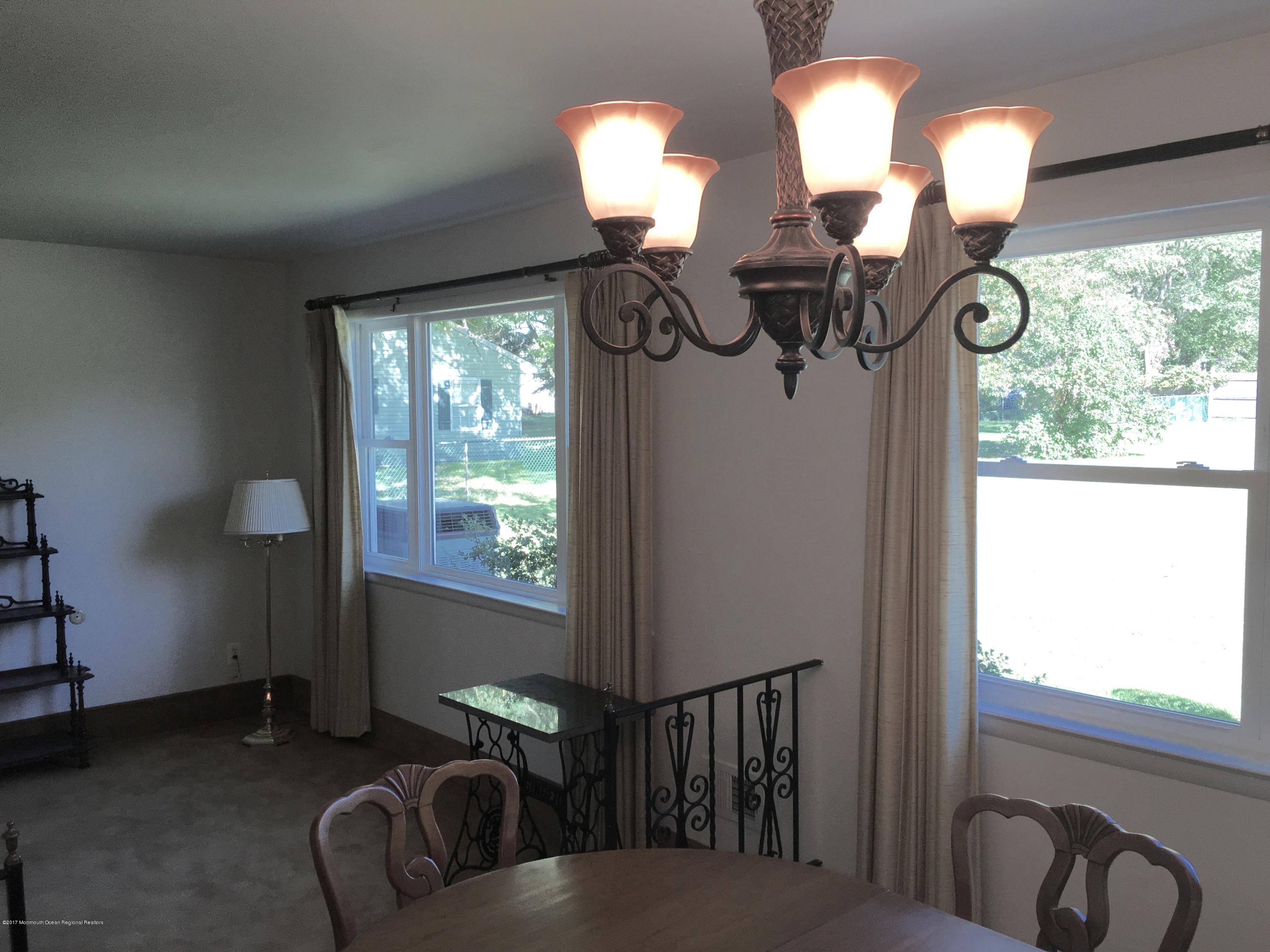 10 Fenimore Road Freehold, NJ 07728 - Photo 15 of 36 a view of living room with furniture and windows
