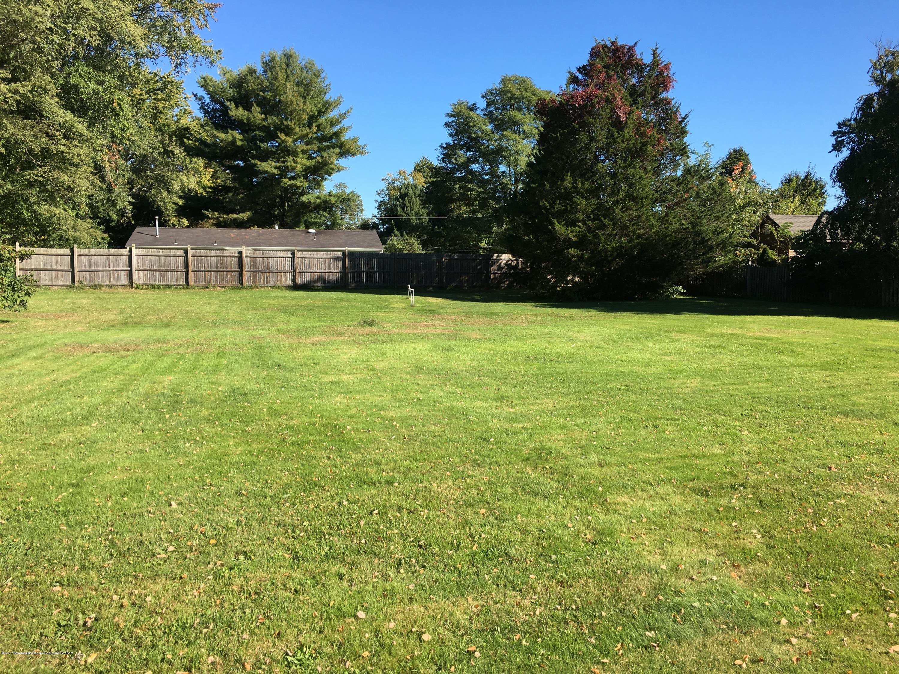 10 Fenimore Road Freehold, NJ 07728 - Photo 36 of 36 a view of a yard with a house