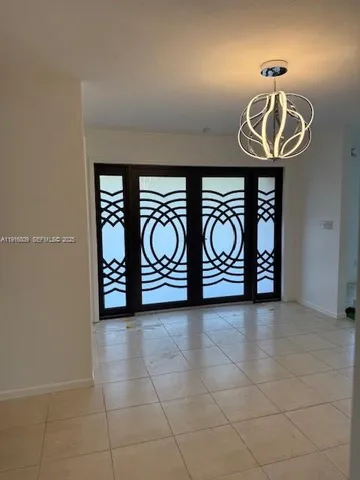 a view of a storage & utility room with two washing machine