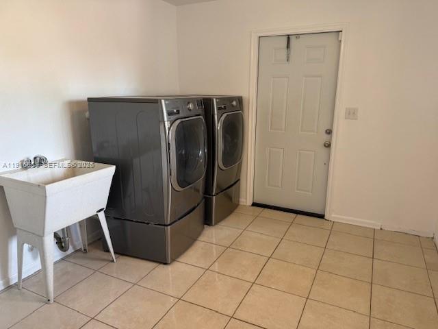 29325 Southwest 182nd Avenue Homestead, FL 33030 - Photo 21 of 21 a view of a storage & utility room with two washing machine