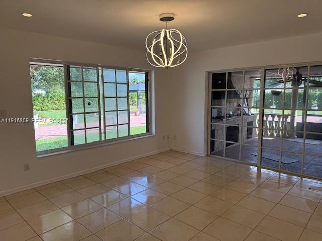 29325 Southwest 182nd Avenue Homestead, FL 33030 - Photo 6 of 21 a view of empty room with wooden floor