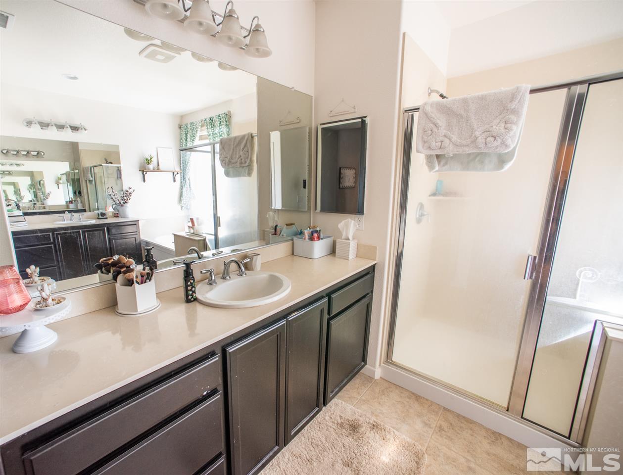 1930 Tawleed Road Reno, NV 89521 - Photo 16 of 28 a bathroom with a sink double vanity and a mirror