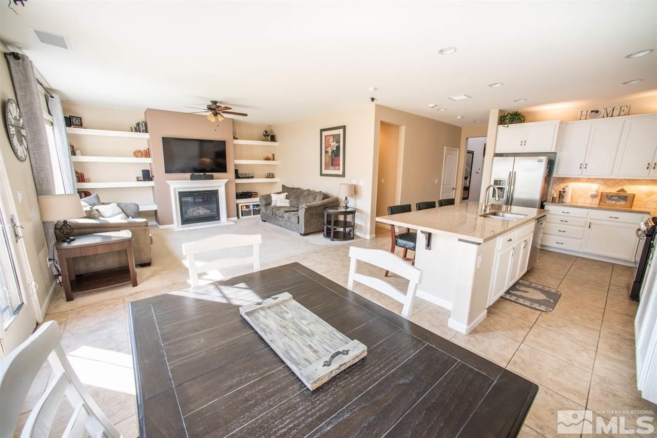 1930 Tawleed Road Reno, NV 89521 - Photo 8 of 28 a living room with stainless steel appliances furniture and a kitchen view