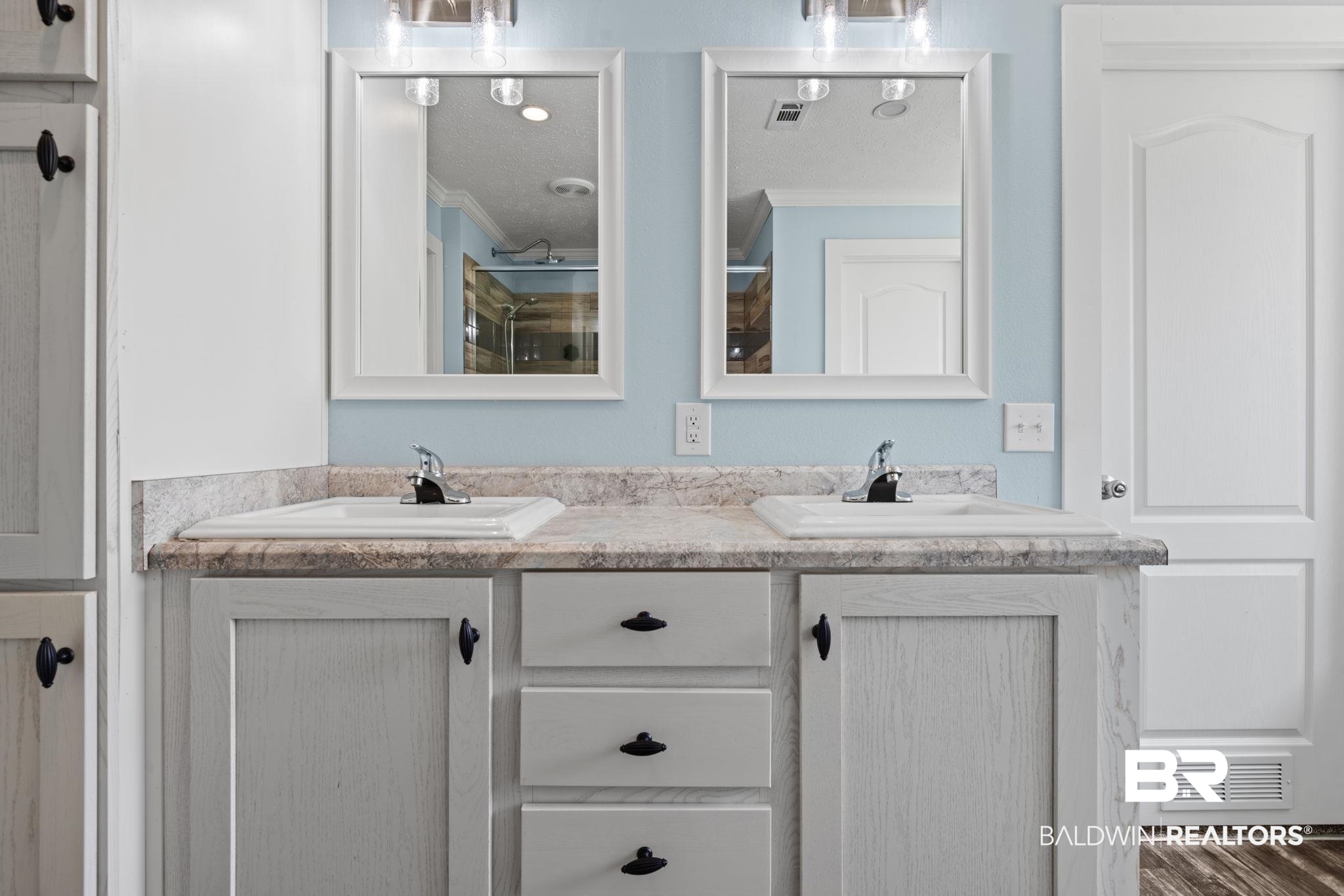10703 South Ridge Drive Semmes, AL 36575 - Photo 25 of 37 Full bathroom featuring ornamental molding, double vanity, a shower with shower door, and wood finished floors