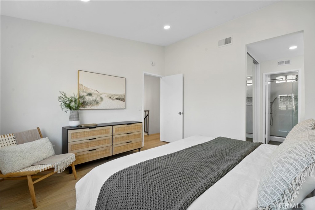 921 Boon Place, Unit A Corona, CA 92881 - Photo 11 of 21 a bedroom with a bed and furniture