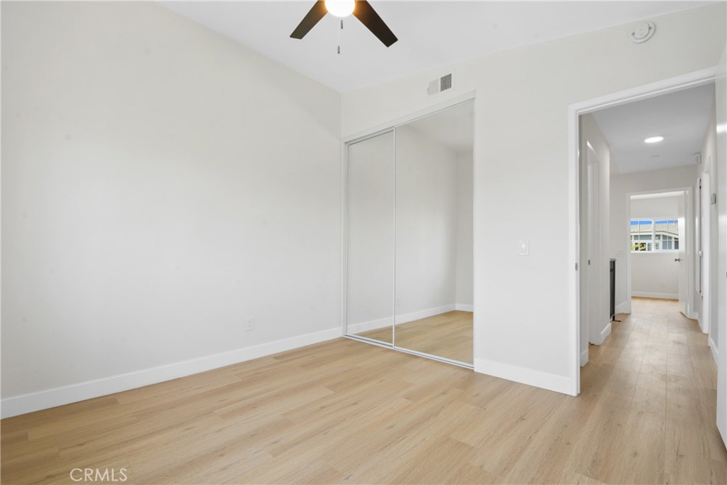 921 Boon Place, Unit A Corona, CA 92881 - Photo 18 of 21 wooden floor in an empty room