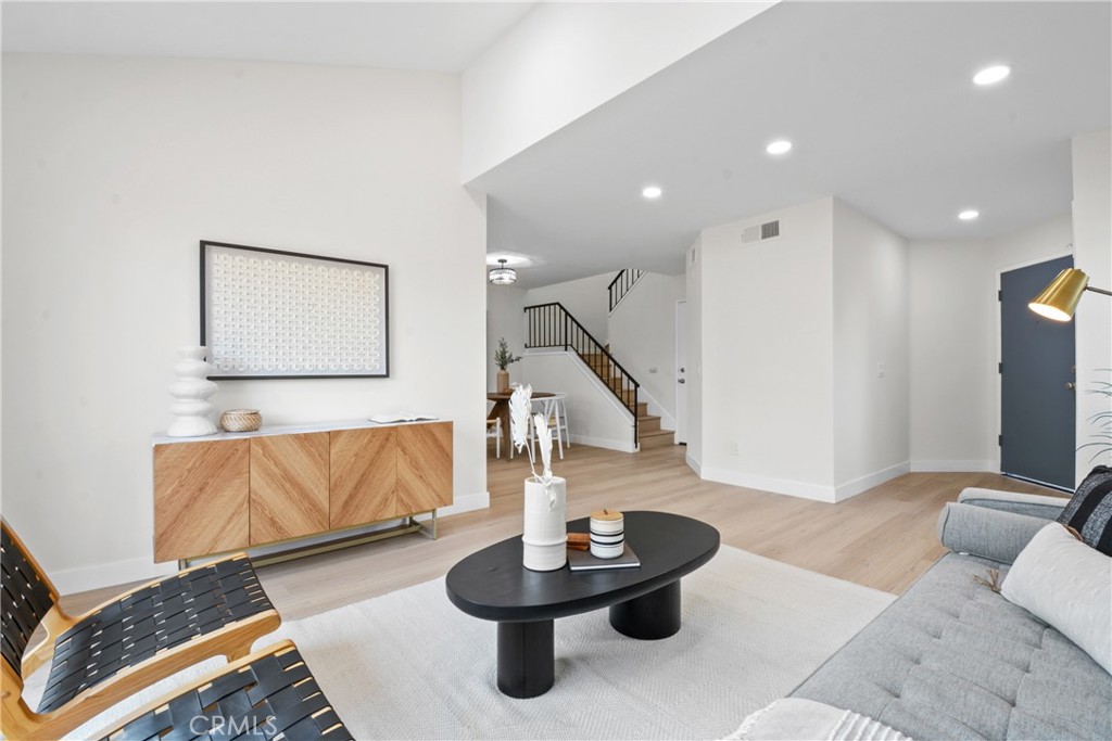 921 Boon Place, Unit A Corona, CA 92881 - Photo 3 of 21 a living room with furniture and a flat screen tv