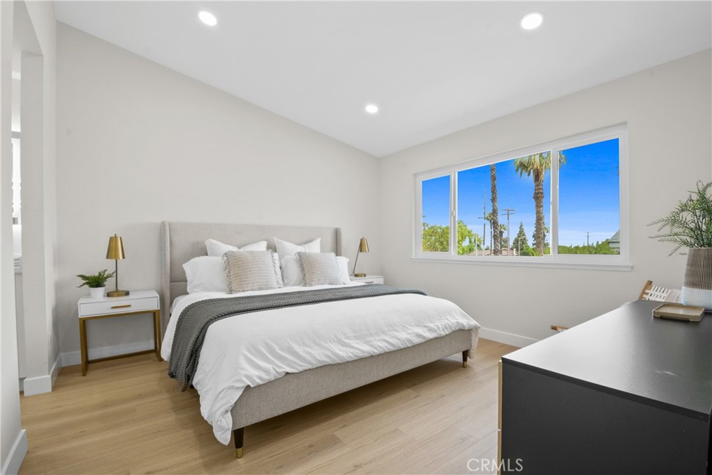 921 Boon Place, Unit A Corona, CA 92881 - Photo 10 of 21 a bedroom with a bed and window
