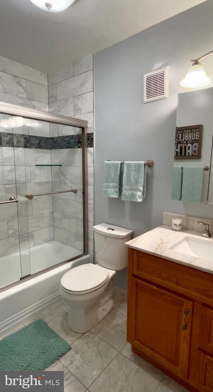 8418 Manassas Circle Vienna, VA 22180 - Photo 13 of 43 Updated hall bathroom