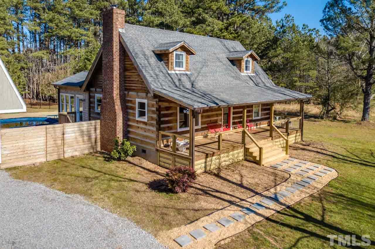 2704 Mt Vernon Church Road Raleigh, NC 27613 - Photo 1 of 23 a view of a house with sitting area