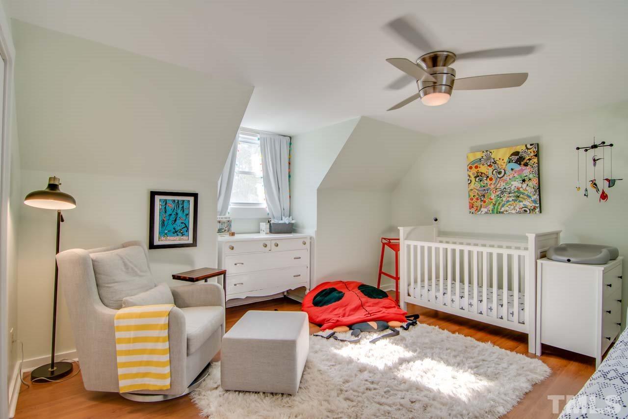 2704 Mt Vernon Church Road Raleigh, NC 27613 - Photo 12 of 23 a bedroom with furniture and a window